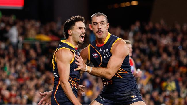 Taylor Walker (right) has been concerned for Rankine after the hit. (Photo by Dylan Burns/AFL Photos via Getty Images)