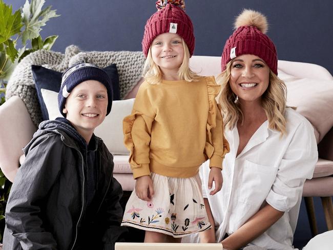 Carrie Bickmore, who is expecting her third child, pictured with Ollie, 10, and Evie, three, at the launch of a new line of Beanies 4 Brain Cancer.