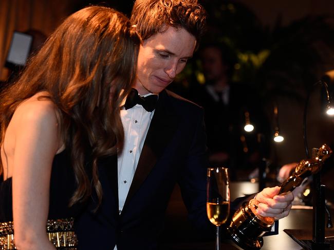 Actor Eddie Redmayne (R) and Hannah Bagshawe attend the 87th Annual Academy Awards Governors Ball at the Highland Center in LA. Picture: Getty