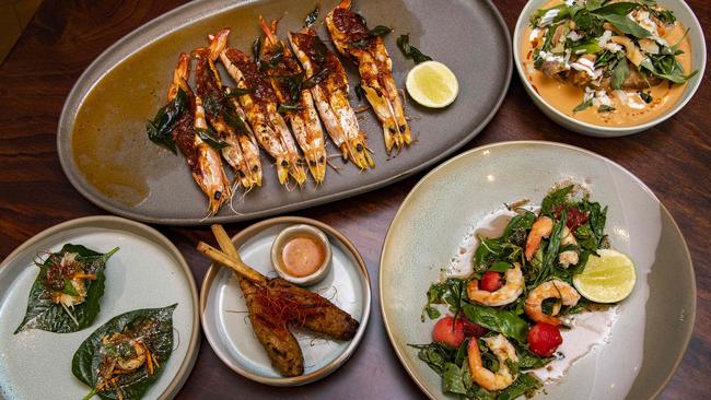 Little Sister has recently opened on the Esplanade, run by couple Carlton and Tiina Horn. Little Sister tasting plate dishes (clockwise from top) BBQ prawns, curry butter, shallots, curry leaf; Red curry of confit duck, lychee, choy sum; Prawn watermelon salad, red nam jim, Thai basil, Vietnamese mint, fried shallots, peanuts; Sugar cane pork sticks, nouc cham, fried shallots; Crispy rice, green pawpaw, ginger, hot mint, Kaffir lime. Picture: Brian Cassey