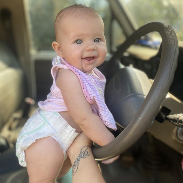 Madelin Rowe getting comfortable behind the wheel of daddy’s Cruiser. Picture: Shani Cooper