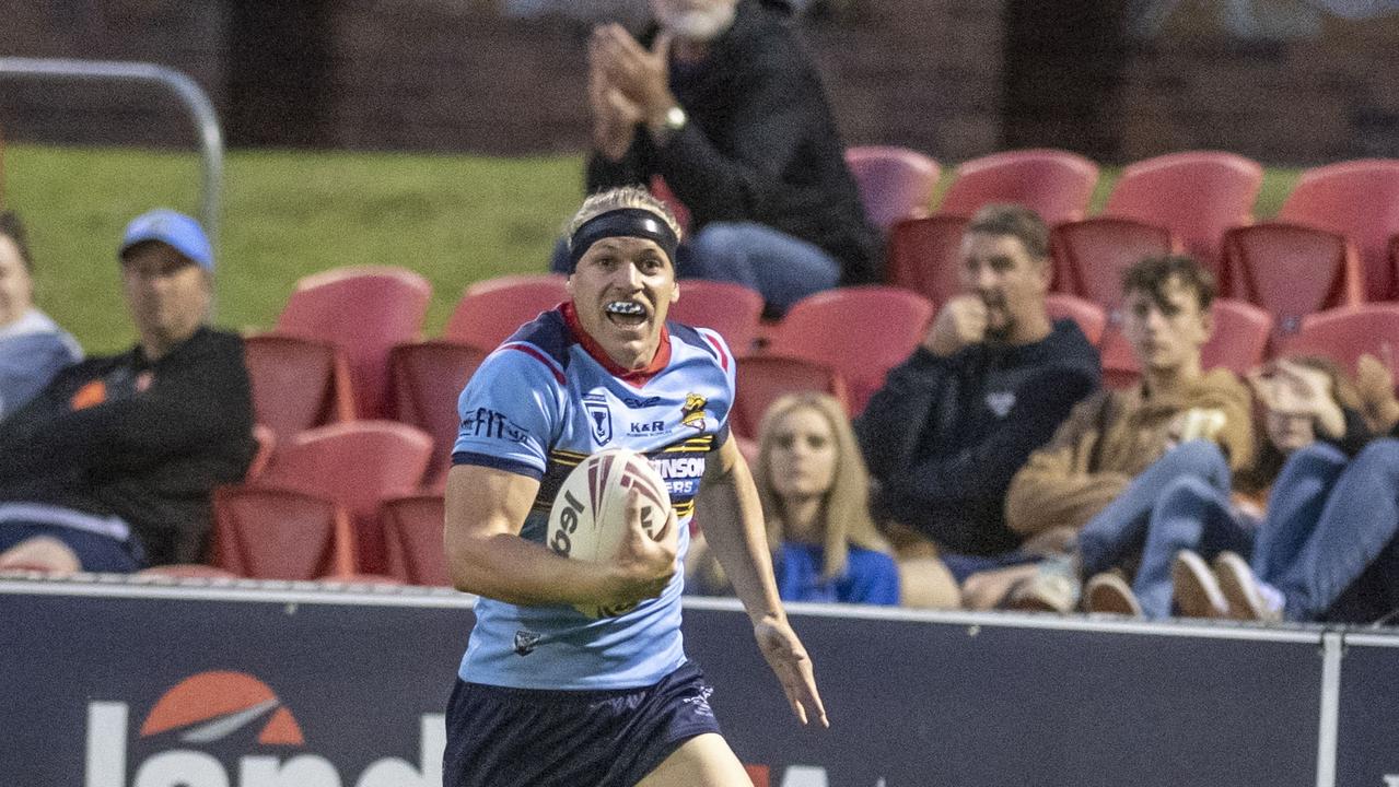 Mitchell Watson on his way to score the third of his five tries for Western Clydesdales against Ipswich Jets. Picture: Nev Madsen.