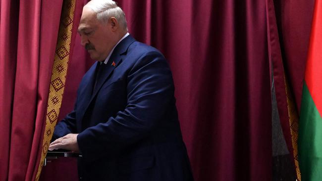 Lukashenko casting his own vote in the “sham” election. Picture: Natalia Kolesnikova/AFP