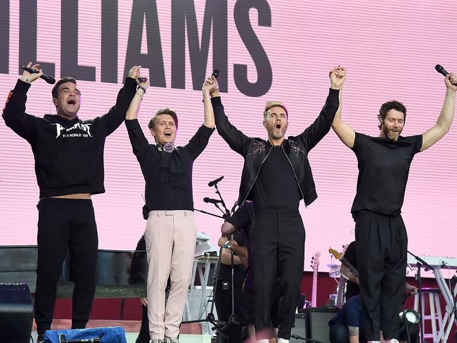 Robbie Williams with Howard Donald, Gary Barlow and Mark Owen of Take That on stage during the One Love Manchester Benefit Concert at Old Trafford on June 4, 2017 in Manchester, England. Picture: Kevin Mazur/One Love Manchester/Getty Images for One Love Manchester