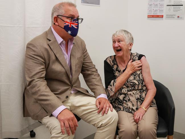 Prime Minister Scott Morrison with an elderly woman who received one of the first COVID-19 vaccines. Picture: Justin Lloyd