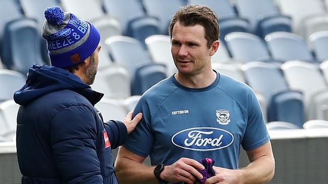 Geelong Cats coach Chris Scott speaks with Patrick Dangerfield after training. Picture: Alison Wynd