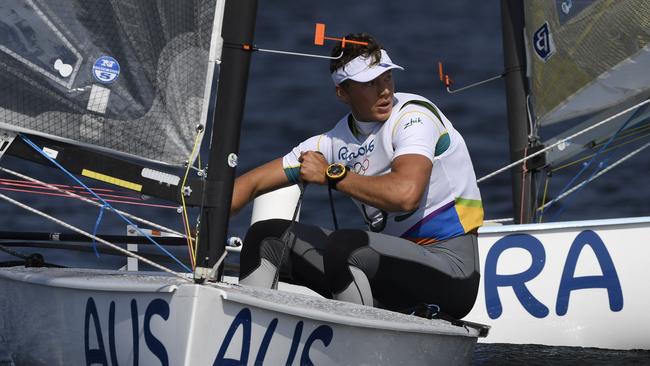 Australia's Jake Lilley competes in the Finn Men sailing class on Marina da Gloria in Rio de Janeiro during the Rio 2016 Olympic Games on August 9, 2016. / AFP PHOTO / WILLIAM WEST