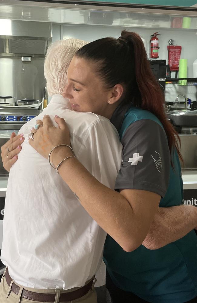 Having met each other for the first time, Mr Leckenby and Ms Brewster embrace, thanking each other for the others work. Photo: Fergus Gregg