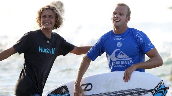 Giant-killer Stuart Kennedy (right) leaves the water after defeating Gabriel Medina. Picture: Adam Head