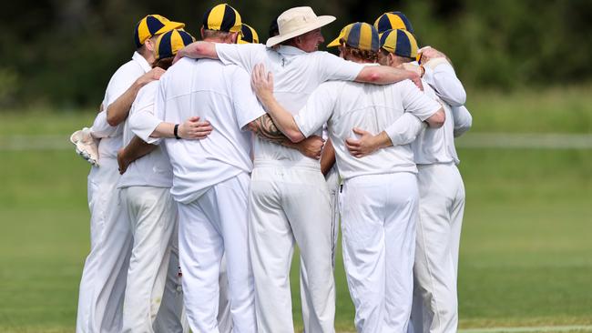 DVCA: Lower Eltham players huddle up. Picture: George Sal