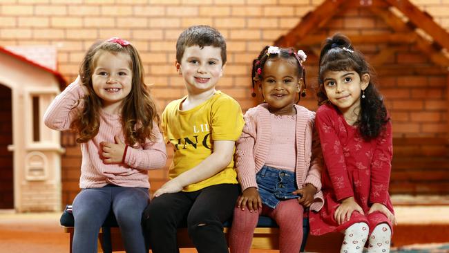 Emilia Romovic, Maximus Karantonis, Aseel Siddig and Merna Said. Waitlists for childcare in Sydney are at all time highs as are the costs. Picture: Richard Dobson