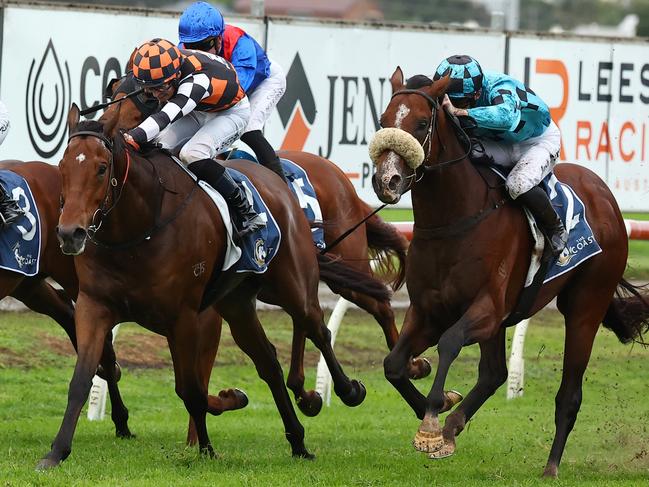 NEWCASTLE, AUSTRALIA - MAY 11: Tom Sherry riding Magnaspin wins Race 8 The Coast during "The Coast Raceday" - Sydney Racing at Newcastle Racecourse on May 11, 2024 in Newcastle, Australia. (Photo by Jeremy Ng/Getty Images)