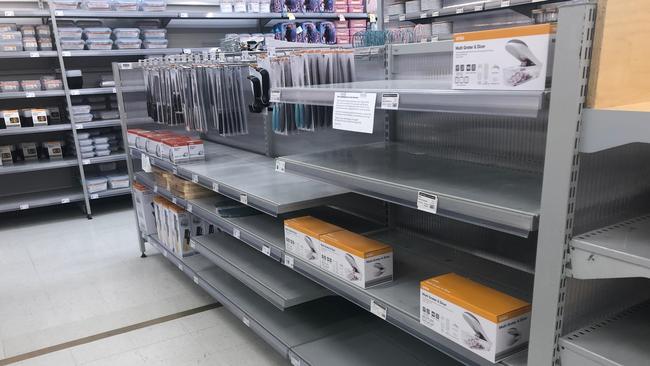 Kitchenware shelves almost empty at Robina Town Centre Kmart Store on the Gold Coast