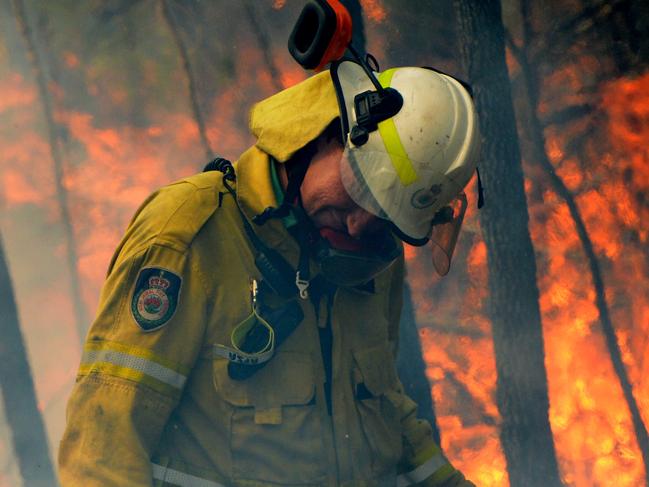 *This picture has been selected as one of the Best of the Year News images for 2019* NSW Rural Fire fighters establish a backburn  in Mangrove Mountain, New South Wales, Sunday, December 8, 2019.  (AAP Image/Jeremy Piper) NO ARCHIVING