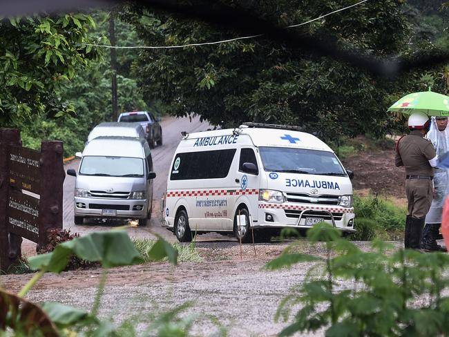 An ambulance leaves from the Tham Luang cave area as the operations continue for those still trapped inside the cave.