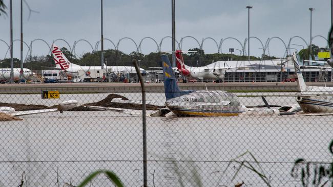 A flooded area at Cairns Airport in Cairns on December 18, 2023, closing the site for a number of days. (Photo by Brian CASSEY / AFP)