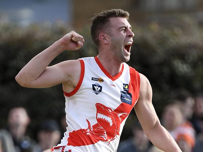 James Hallahan celebrates a goal during the MPNFL Division 1 grand final between The Pines and Sorrentoin Frankston, Sunday, Sept. 16, 2018. Picture: Andy Brownbill)