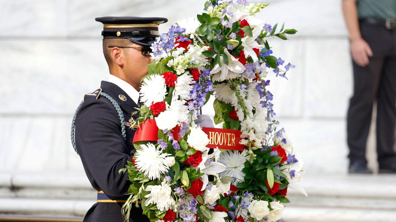 Thee US Army released a statement confirming a cemetery worker has been “abruptly pushed aside” during the visit. Picture: Anna Moneymaker/Getty Images/AFP