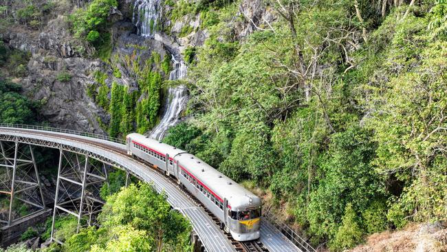 The Savannahlander, a 2000 diesel rail class motor crosses the train bridge at Stoney Creek, on the Cairns to Kuranda railway line. Picture: Brendan Radke