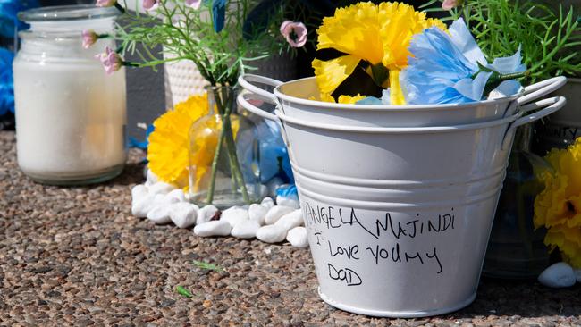 A memorial has been set up at the scene of a fatal stabbing of a 36-year-old Wadeye man outside the Cavenagh Street Woolworths supermarket on Saturday, September 16.Picture: Pema Tamang Pakhrin