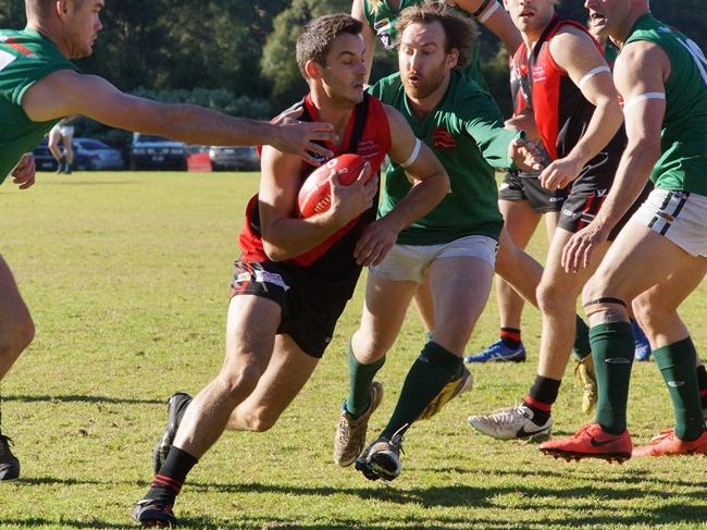 Matthew Dompietro slips a tackle during his days at Emerald. Picture: Robyn Kuys