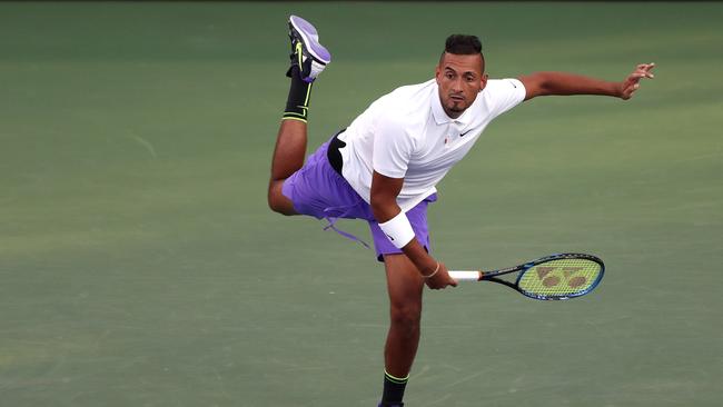 Nick Kyrgios serves against Antoine Hoang. (Photo by Matthew Stockman/Getty Images)