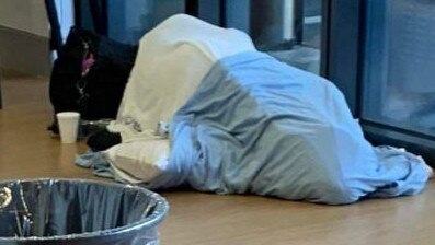 A patient sleeping on the floor in Gold Coast University Hospital’s Emergency Department.