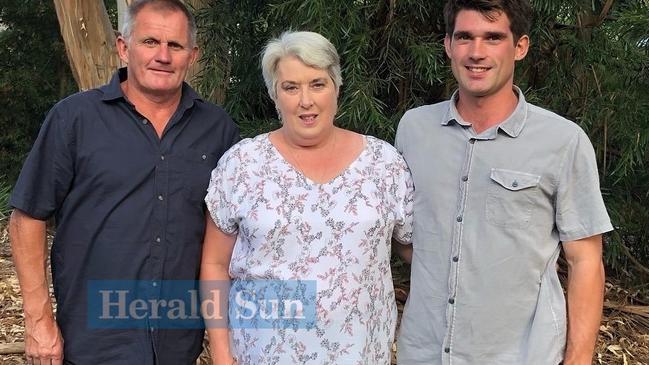 Jarrod Davies with his adoring parents Rob and Jill.