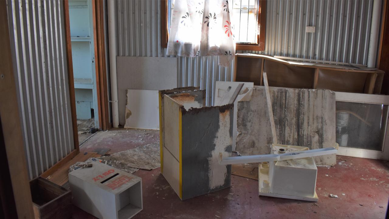 Destroyed furniture in the rear store room.