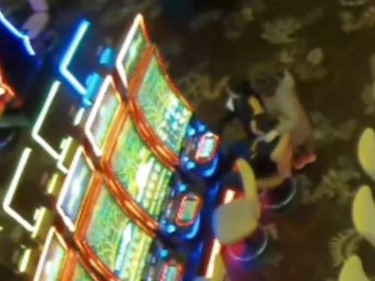 CCTV footage at The Star shows the 12-year-old girl playing the pokies with her parents.