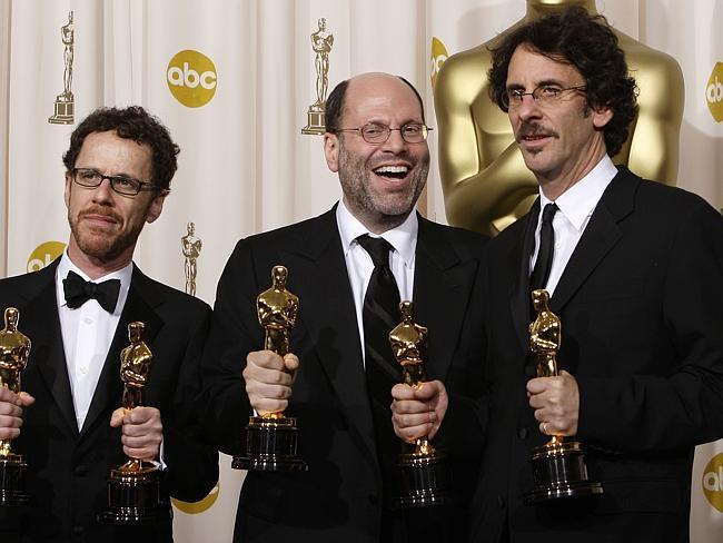 Scott Rudin with the Coen brothers backstage after No Country For Old Men won the Best Picture Oscar.