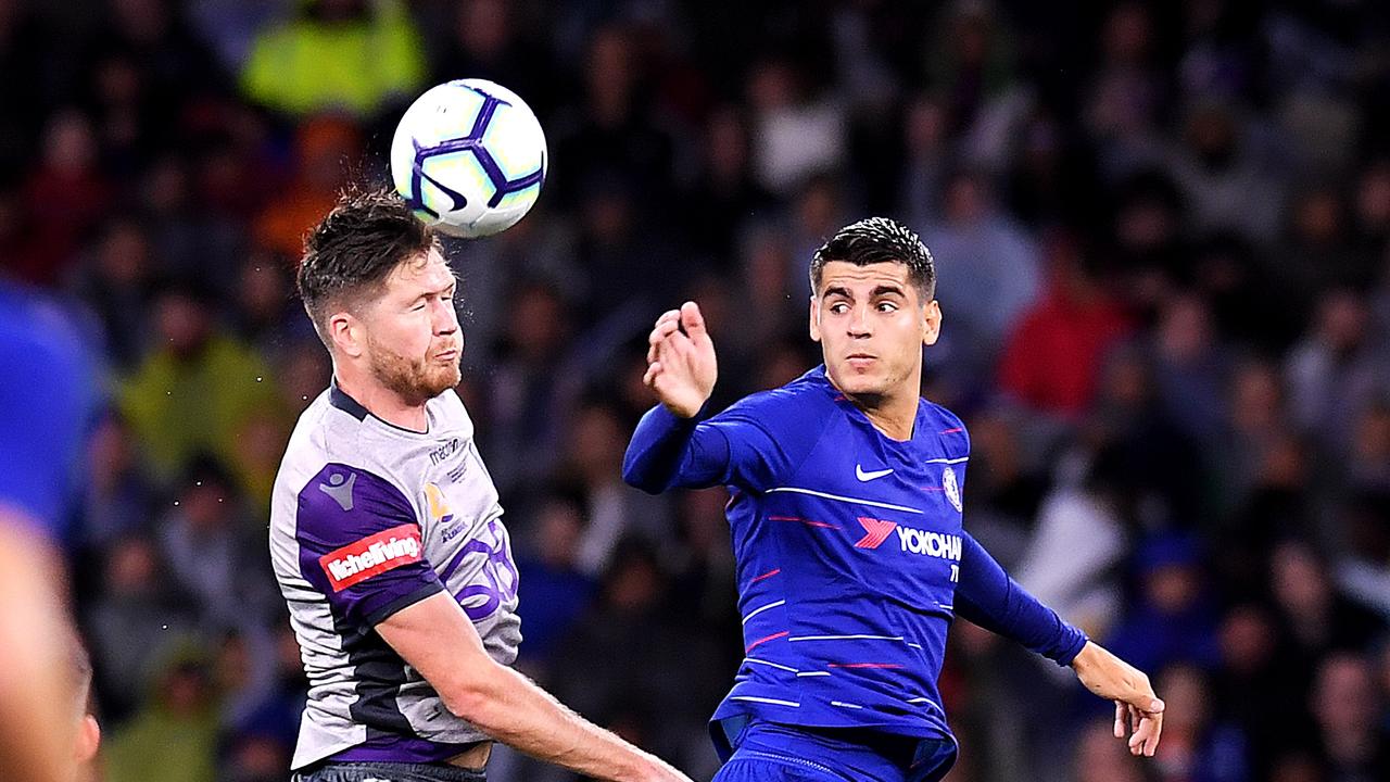 Alex Grant and Alvaro Morata compete for the ball in what was a frustrating night for the Chelsea striker