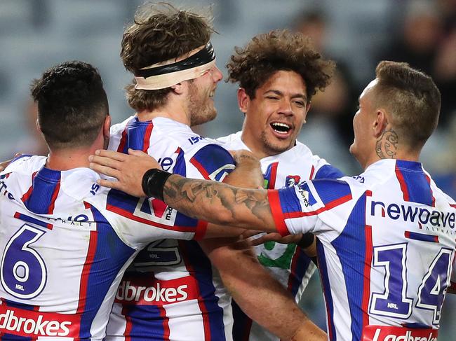 Newcastle's Lachlan Fitzgibbon celebrates scoring a try during the Parramatta Eels v Newcastle Knights rugby league match at ANZ Stadium, Homebush. Picture: Brett Costello