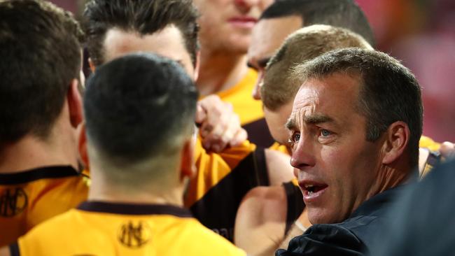 SYDNEY, AUSTRALIA – JUNE 21: Alastair Clarkson, coach of the Hawks, talks to players during the round 14 AFL match between the Sydney Swans and the Hawthorn Hawks at Sydney Cricket Ground on June 21, 2019 in Sydney, Australia. (Photo by Cameron Spencer/AFL Photos/via Getty Images)