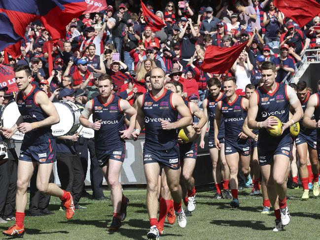 Jace Bode, centre, leads Norwood onto Adelaide Oval for the 2018 SANFL grand final against North Adelaide. Bode has called time on his football career. Picture: SARAH REED