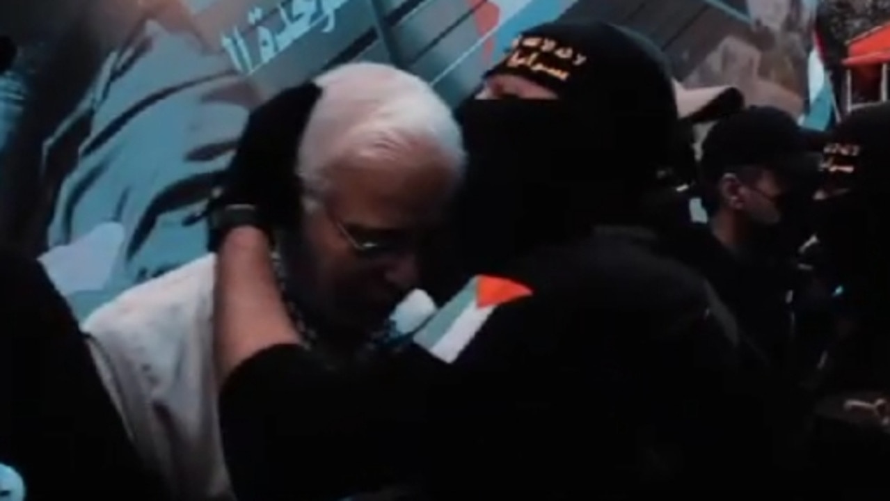 A video of the 2023 memorial event shows Fayez Elhasani being embraced by a Palestinian Islamic Jihad member.