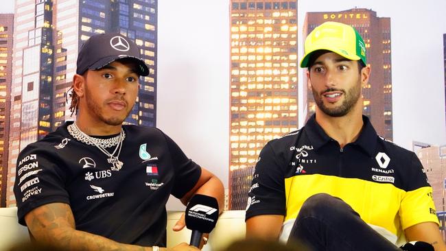 Lewis Hamilton of Great Britain and Mercedes GP and Daniel Ricciardo of Australia and Renault Sport F1 during a press conference ahead of the Formula 1 Australian Grand Prix 2020 at the the Albert Park Circuit in Melbourne, Thursday, March 12, 2020. (AAP Image/Scott Barbour) NO ARCHIVING, EDITORIAL USE ONLY