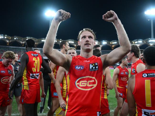 GOLD COAST, AUSTRALIA - JUNE 29: Jack Lukosius of the Suns celebrates victory during the round 16 AFL match between Gold Coast Suns and Collingwood Magpies at People First Stadium, on June 29, 2024, in Gold Coast, Australia. (Photo by Matt Roberts/AFL Photos/via Getty Images)