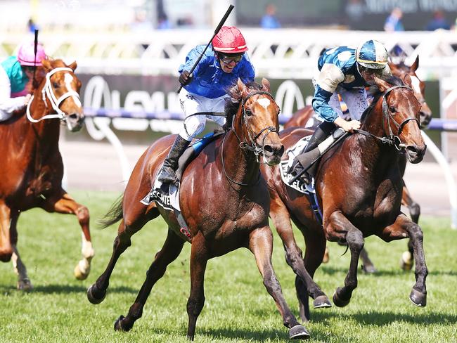 Jockey Kerrin McEvoy riding Cross Counter to the finish line. Picture: Getty