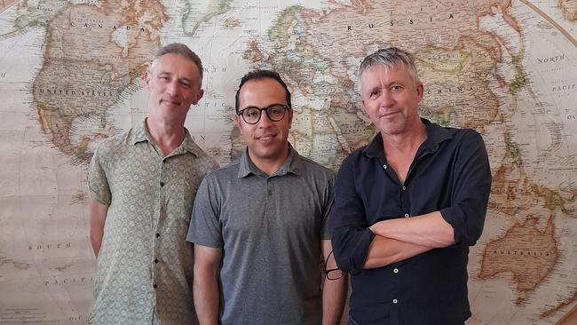 Friends in need: Afghan cricket journalist Mustafa Qamari, centre, with the hosts of The Australian's Cricket Etc podcast, Gideon Haigh, left, and Peter Lalor. Picture: Cecilia Haigh.