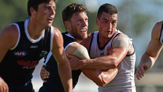 Tom Rockliff wrestles with Brad Ebert during Port Adelaide’s intraclub hitout. Picture: Tom Huntley