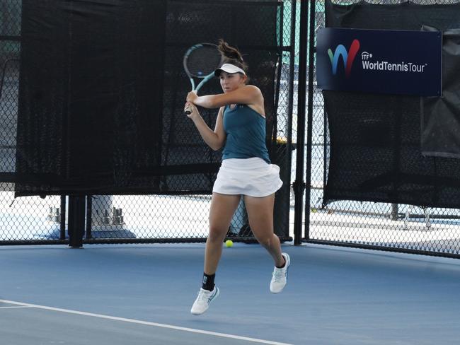 Cairns hometown hero Sienna Jensen in action at the ITF World Tennis Tour Cairns Tennis International Tournament against Sophie McDonald in round 1. Picture: Jake Garland