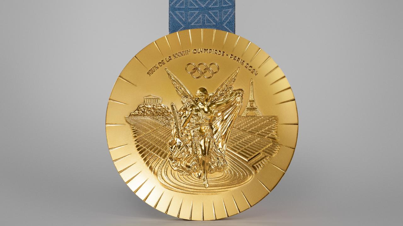 The reverse side of the medals show Nike, the Greek goddess of victory, and include the Eiffel Tower in the background. Picture: Paris Olympic committee / Cyril Masson