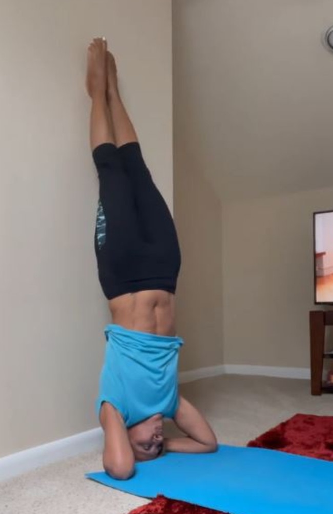 Adrienne Norris, 67, shows off her six-pack in an Instagram video demonstrating how to do a headstand. Picture: Instagram/gammynorris
