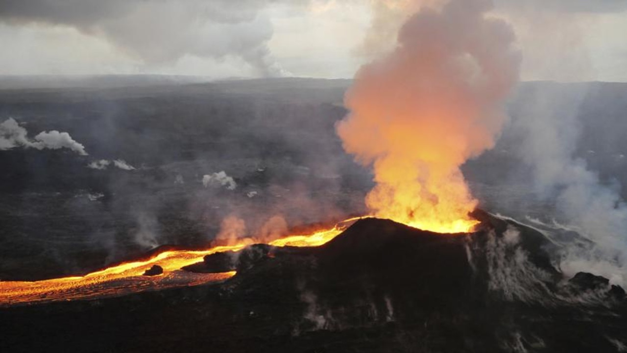 Lava from Kilauea volcano, Hawaii, US, erupts in July 2018. Scientists have discovered around 100 volcanoes in Central Australia that, during the Jurassic period, would have spewed hot ash and lava like Kilauea. Picture: US Geological Survey via AP