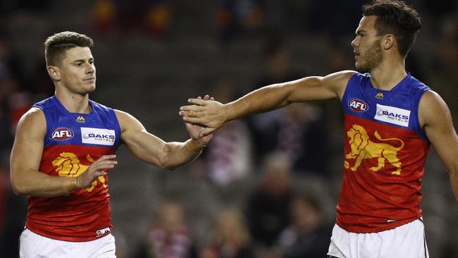 Skipper Dayne Zorko (left) played a key role in Brisbane’s win. Picture: AAP Image/Daniel Pockett.