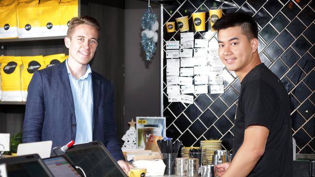 Cafe Piccolo Me barista Rico Halim in the Sydney CBD with journalist Christopher Harris. Picture: Christian Gilles