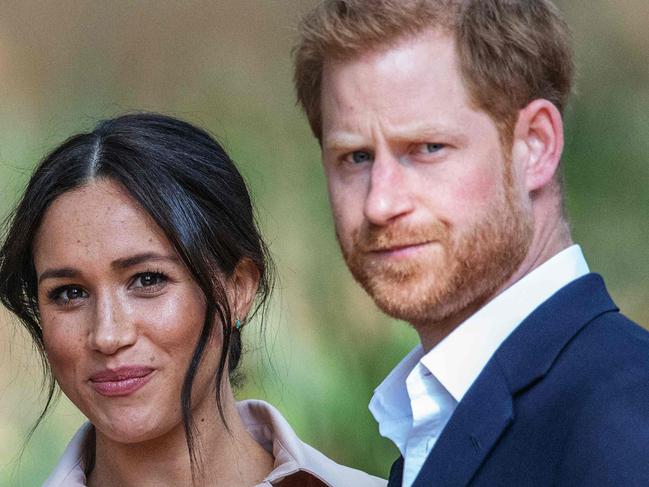 (FILES) In this file photo taken on October 02, 2019 Britain's Prince Harry, Duke of Sussex(R) and Meghan, the Duchess of Sussex(L) arrive at the British High Commissioner residency in Johannesburg where they  will meet with Graca Machel, widow of former South African president Nelson Mandela, in Johannesburg, on October 2, 2019. - Prince Harry Meghan Markle announced Sunday the birth of their daughter Lilibet Diana, who was born in California after a year of turmoil in Britain's royal family. "Lili is named after her great-grandmother, Her Majesty The Queen, whose family nickname is Lilibet. Her middle name, Diana, was chosen to honor her beloved late grandmother, The Princess of Wales," said a statement from the couple. (Photo by Michele Spatari / AFP) / France OUT until 2019-10-17T00:00:00.000+02:00