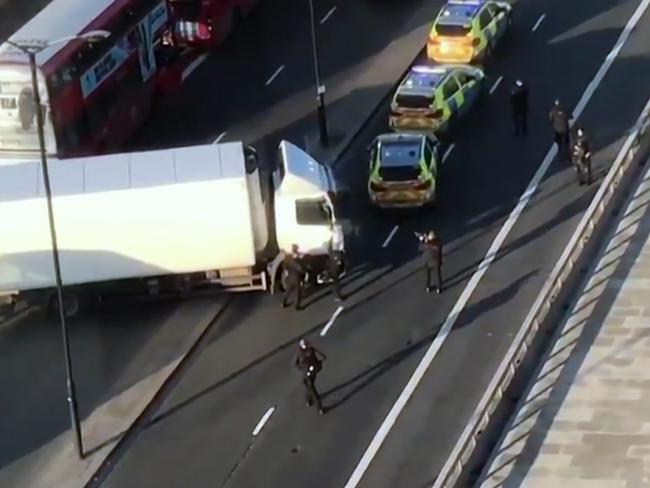 A truck blocking the road where the terrorist attacked. Picture: Luke Poulton/AP