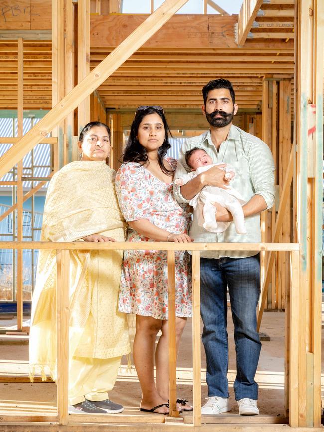 Porter Davis customers Sukhjit Kaur, Taran Kaur and Simerpal Singh with baby Nabab in their home under construction in Hillcrest. Picture: Richard Walker